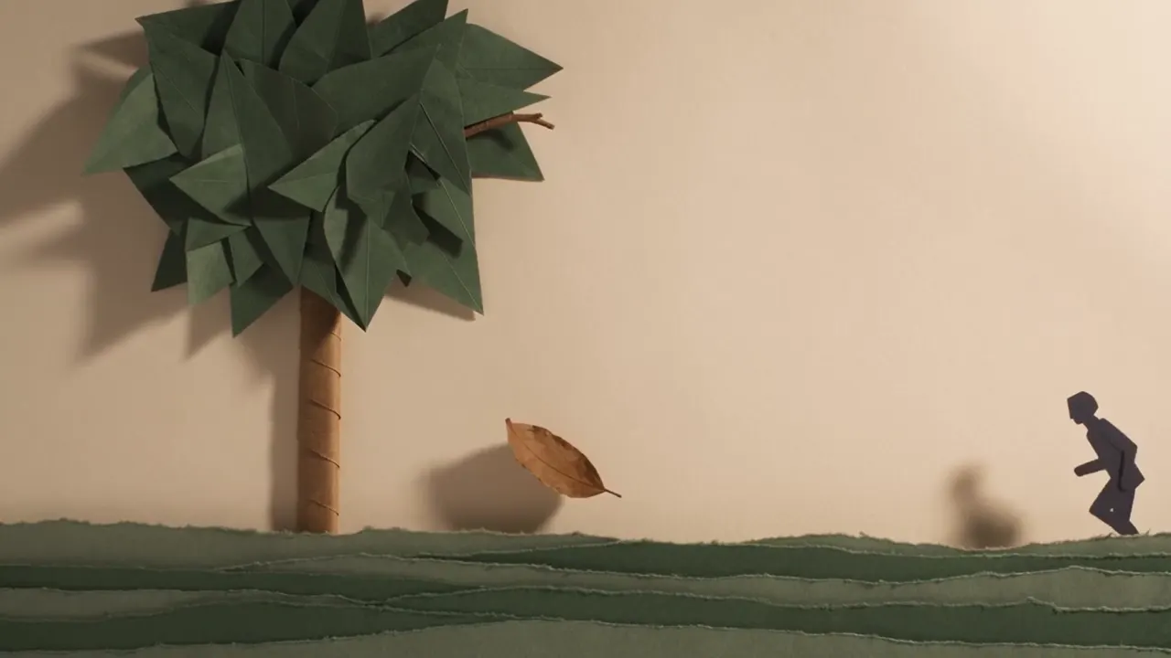 Play the IdeaJar video: a paper-craft leaf falling beside a paper figure running